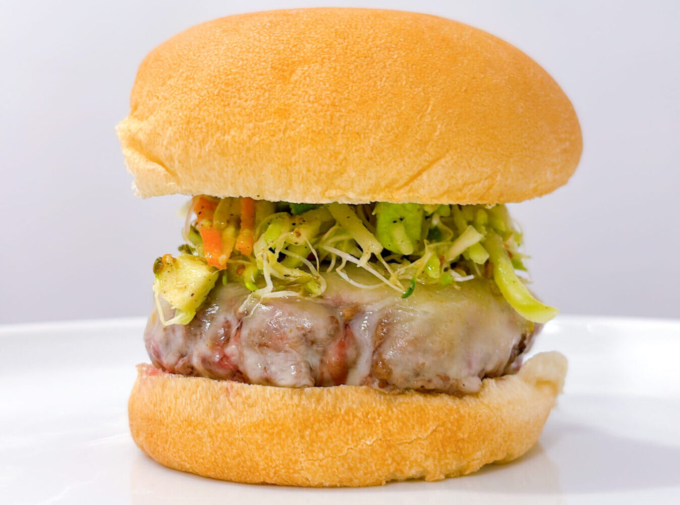 Cheeseburgers with Avocado-Broccoli Slaw