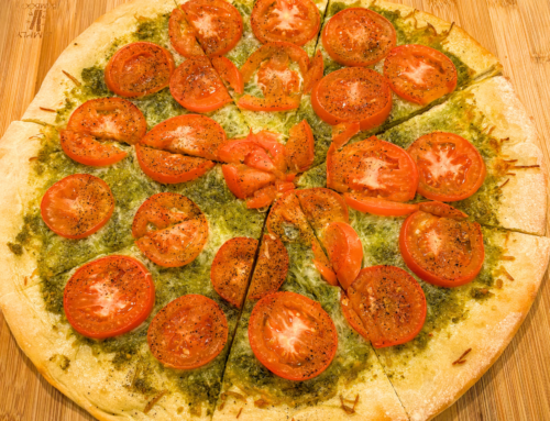 Pizza with Pesto, Fresh Tomatoes, and Mozzarella